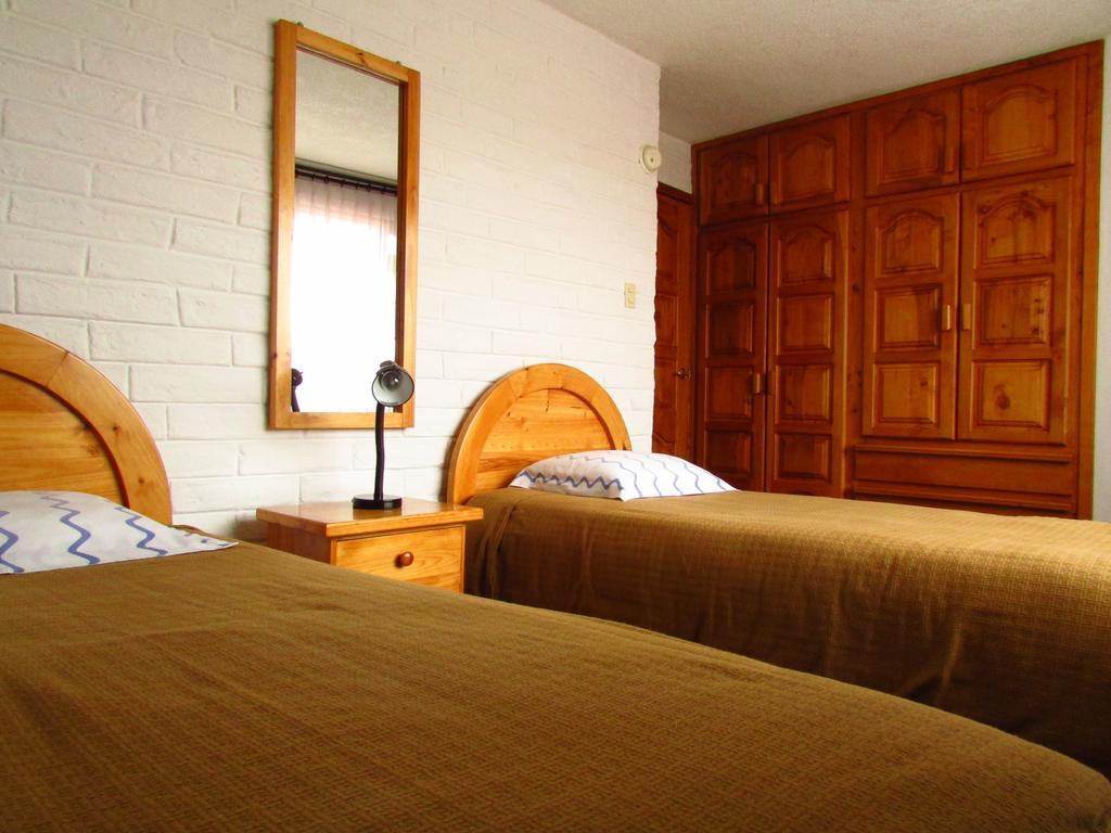 Apartamentos Los Quipus Quito Rum bild