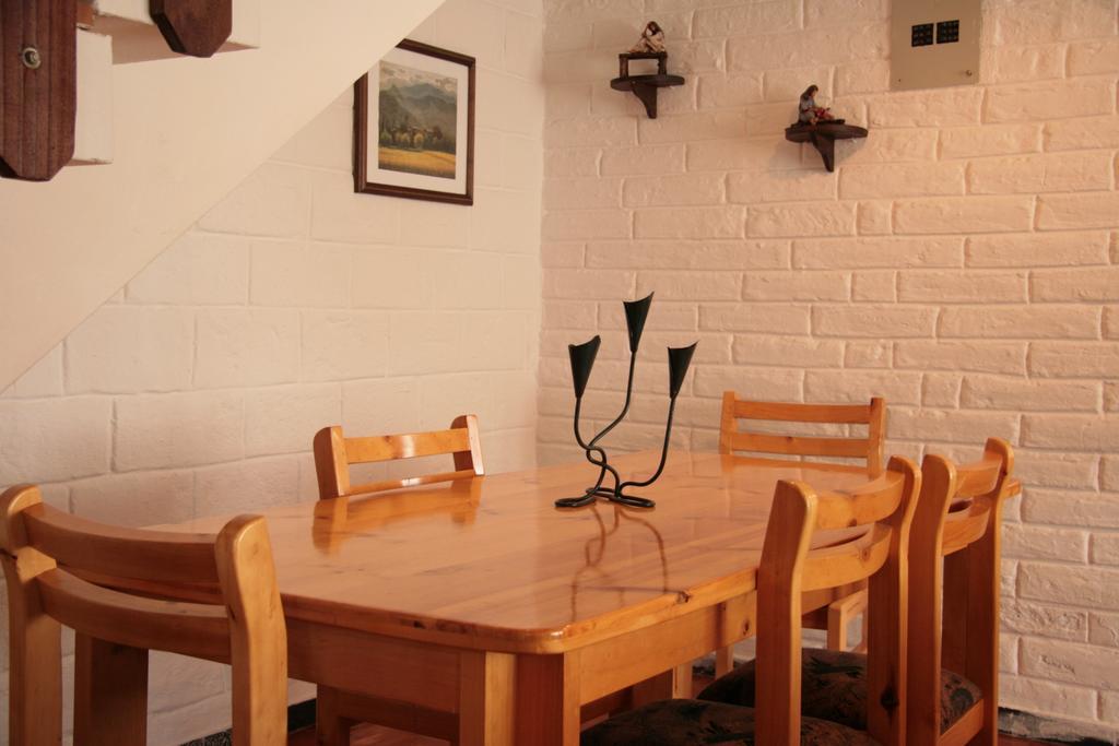 Apartamentos Los Quipus Quito Rum bild
